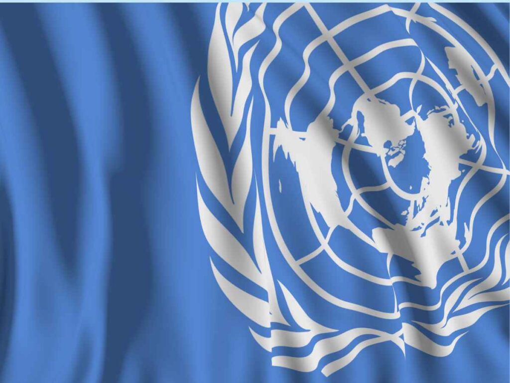 bandeira da ONU com o símbolo oficial em branco sobre fundo azul